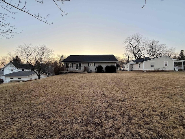 414 S Wisconsin St, Mineral Point, WI 53565 - view of front facade featuring a lawn