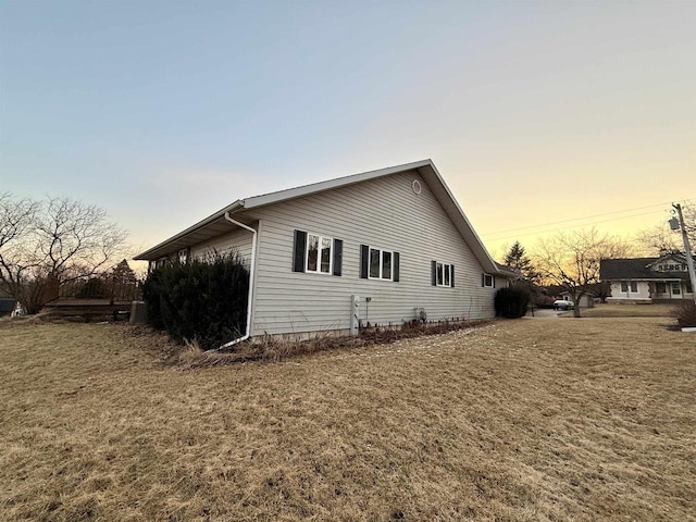 414 S Wisconsin St, Mineral Point, WI 53565 - property exterior at dusk featuring a yard