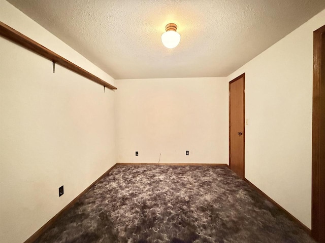 414 S Wisconsin St, Mineral Point, WI 53565 - unfurnished room with carpet floors, a textured ceiling, and baseboards
