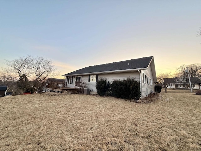 414 S Wisconsin St, Mineral Point, WI 53565 - exterior space featuring a deck, a yard, and central air condition unit