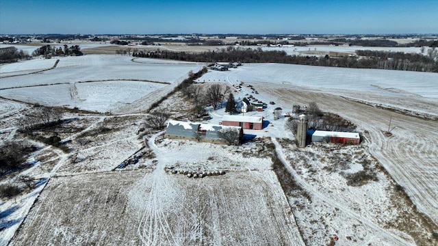 snowy aerial view with a rural view