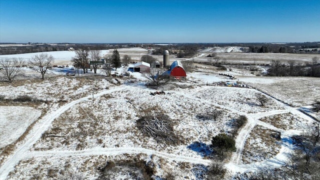 snowy aerial view with a rural view