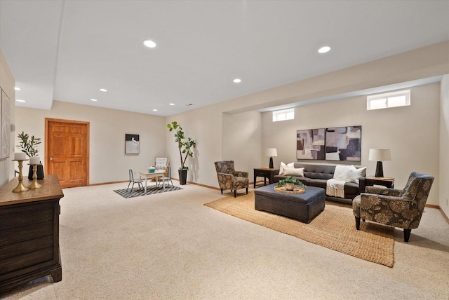 living room with baseboards, recessed lighting, and light colored carpet