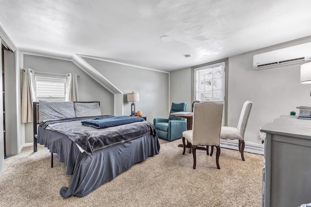 carpeted bedroom with a wall unit AC and multiple windows