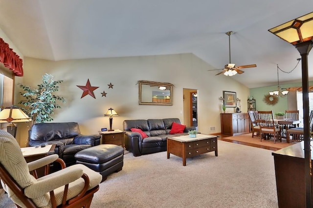 carpeted living room with lofted ceiling and a chandelier