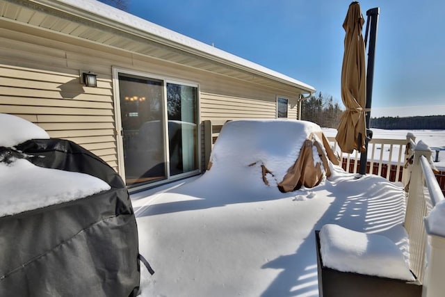 view of snow covered patio