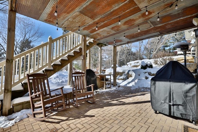 view of snow covered patio