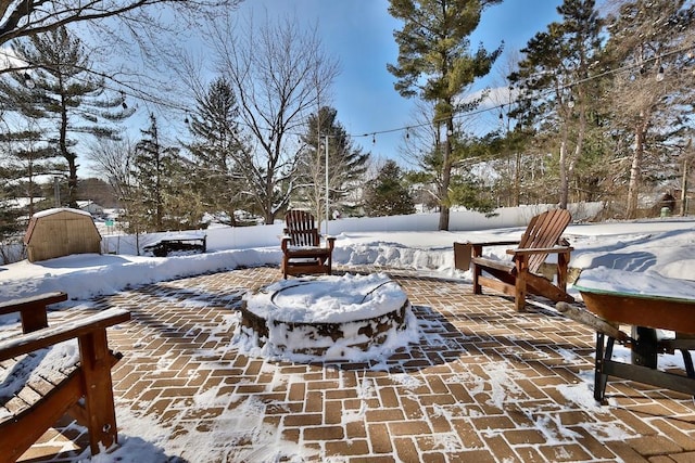 view of snow covered patio