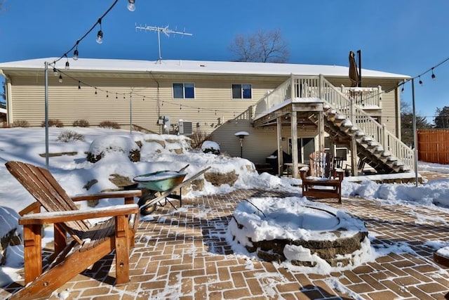 view of snow covered house