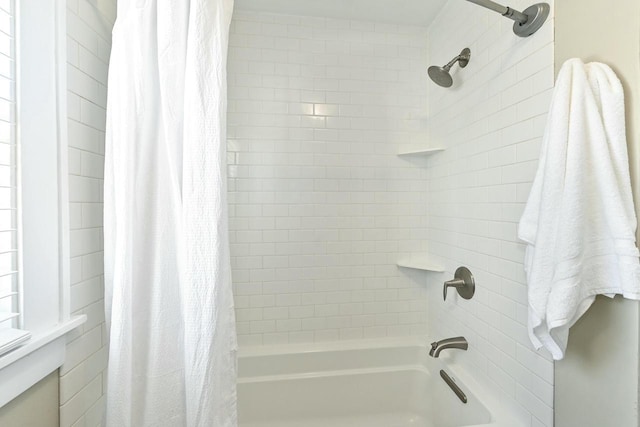 bathroom featuring shower / tub combo