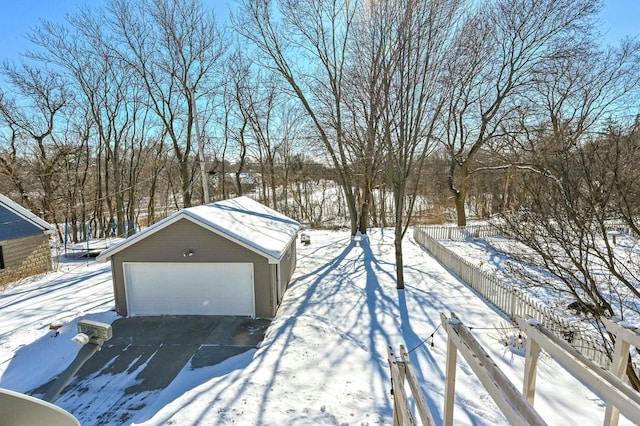 view of snow covered garage