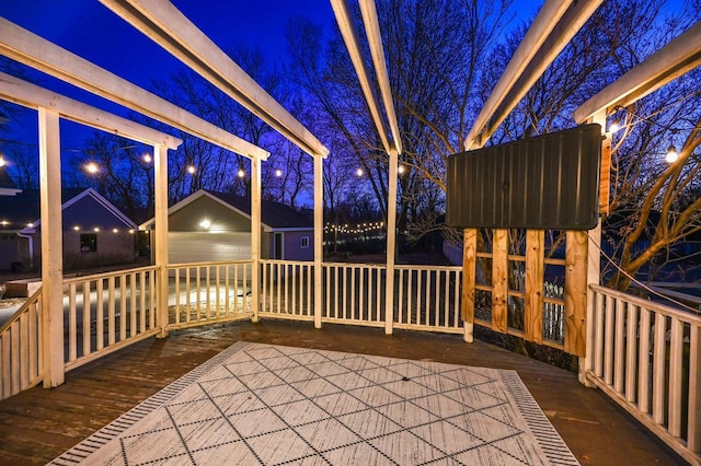 exterior space featuring a garage and an outdoor structure