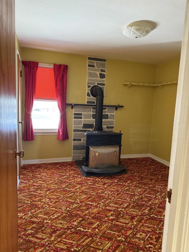 living room with a wood stove