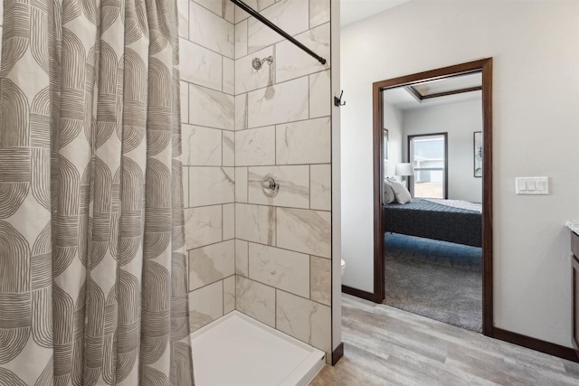 3868 E Teton Ln, Appleton, WI 54913 - full bath with baseboards, ensuite bath, wood finished floors, and a tile shower