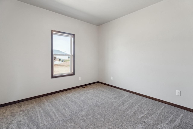 3868 E Teton Ln, Appleton, WI 54913 - spare room with carpet flooring, baseboards, and visible vents