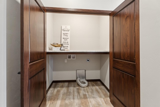 3868 E Teton Ln, Appleton, WI 54913 - washroom with laundry area, light wood finished floors, hookup for a washing machine, electric dryer hookup, and baseboards