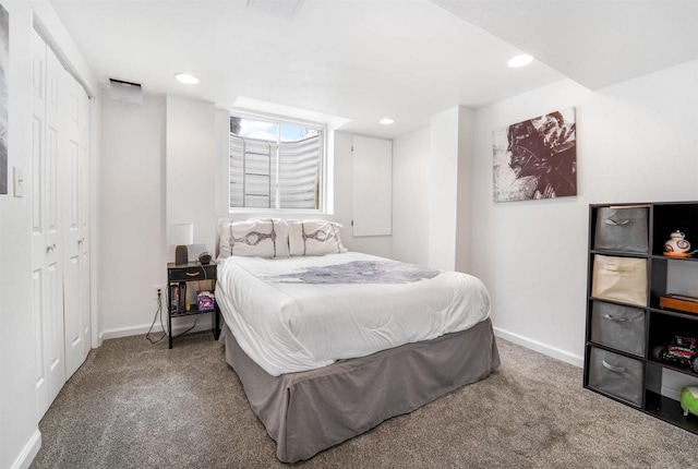 bedroom with a closet and carpet floors