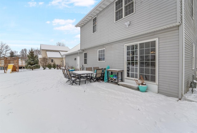 view of snow covered property