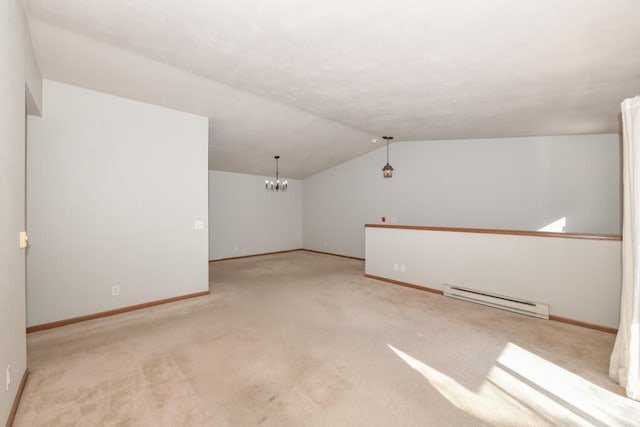 additional living space featuring an inviting chandelier, vaulted ceiling, a baseboard heating unit, and light carpet