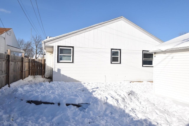 view of snow covered house