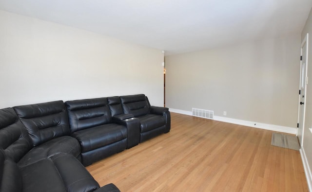 living room with wood-type flooring