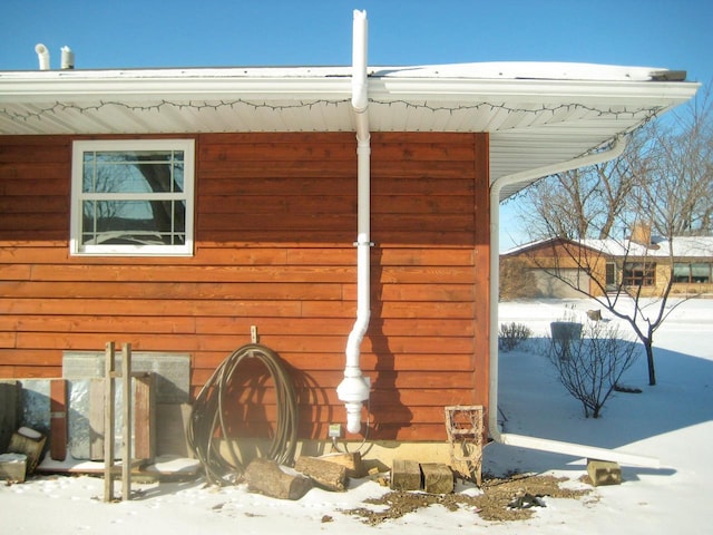 view of snow covered property