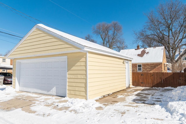 view of snow covered garage