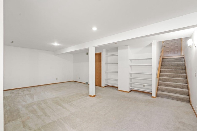 basement featuring carpet floors