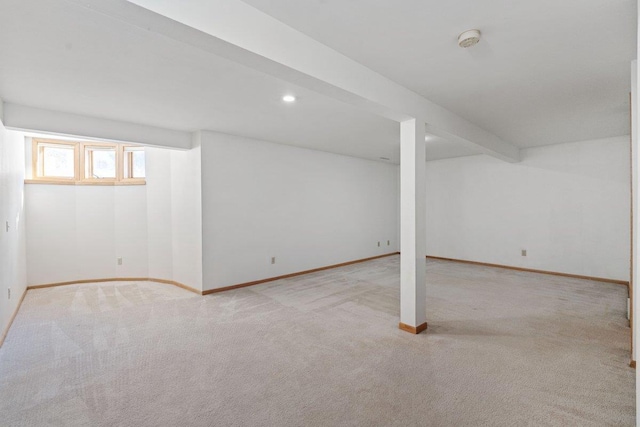 basement with light colored carpet