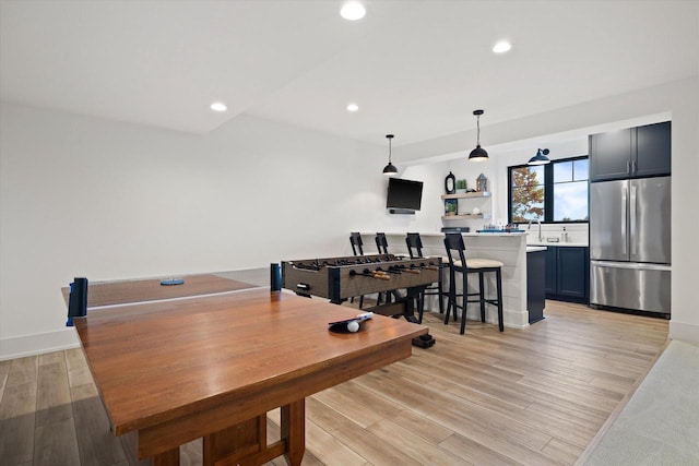 dining room with light hardwood / wood-style floors