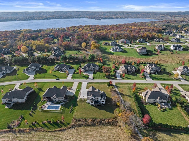 bird's eye view with a water view