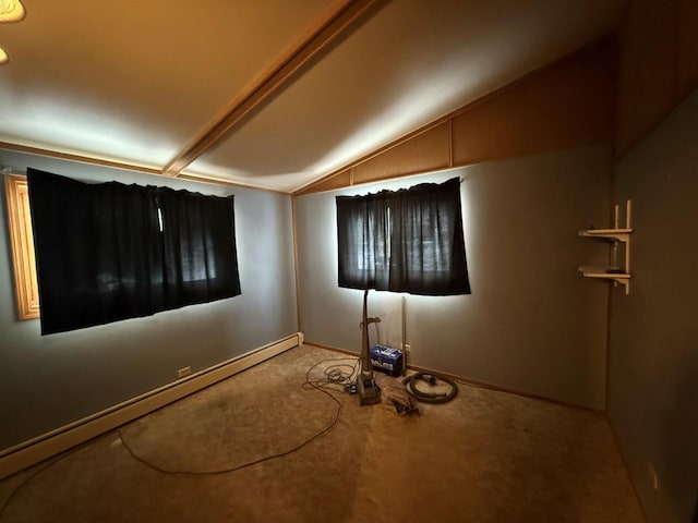 unfurnished bedroom with lofted ceiling and baseboard heating