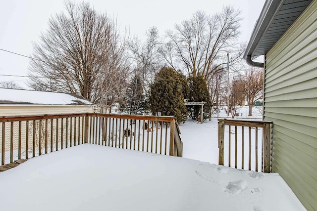 view of snow covered deck