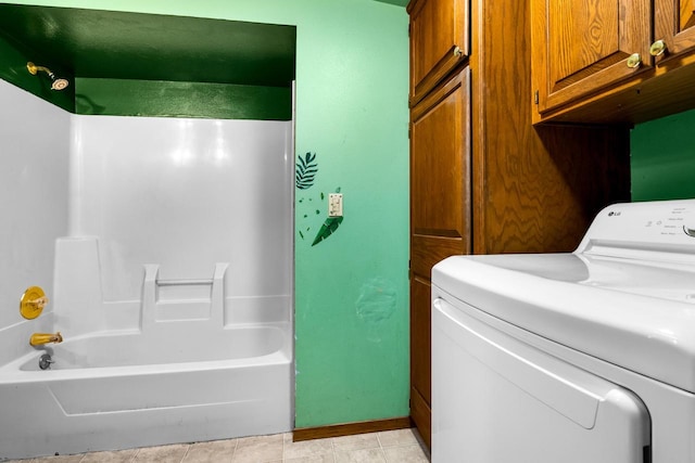 washroom with light tile patterned floors and washer / clothes dryer