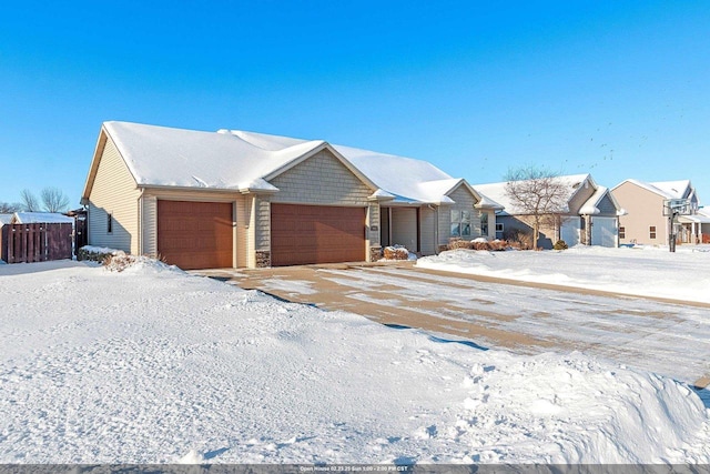 single story home featuring a garage