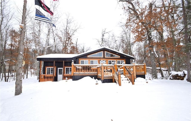 view of front of house with a wooden deck