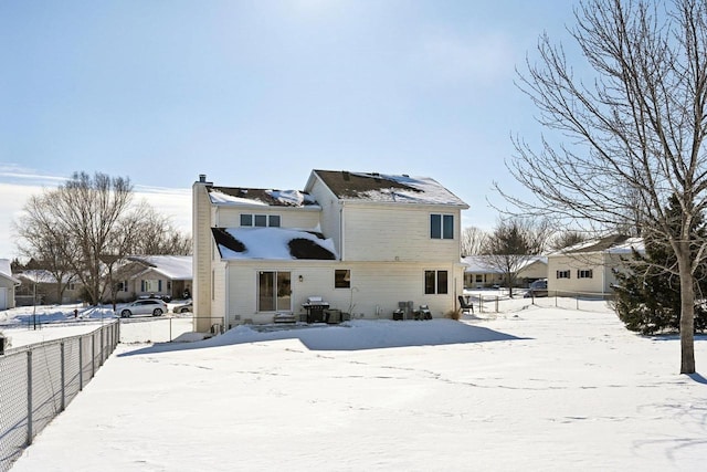 view of snow covered property