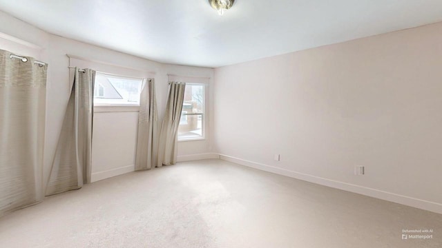 empty room featuring carpet floors