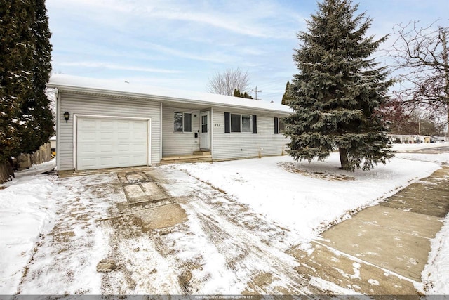 single story home with a garage