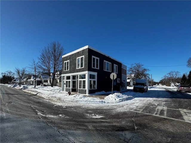 view of snow covered property