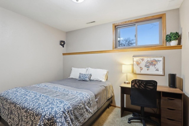 carpeted bedroom with visible vents