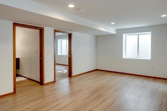 unfurnished room featuring light wood-type flooring