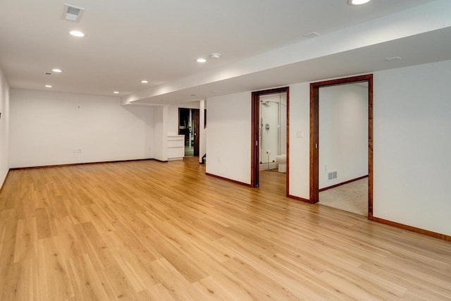 basement featuring light hardwood / wood-style flooring