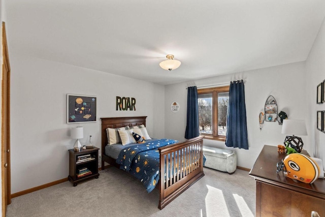 bedroom featuring light colored carpet