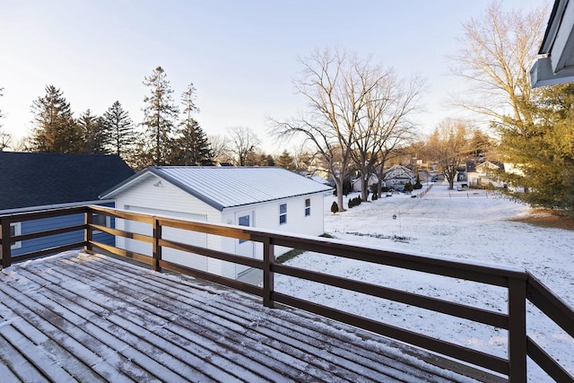 view of snow covered deck