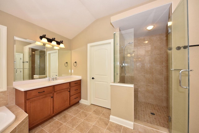 full bath featuring lofted ceiling, a garden tub, a shower stall, and vanity