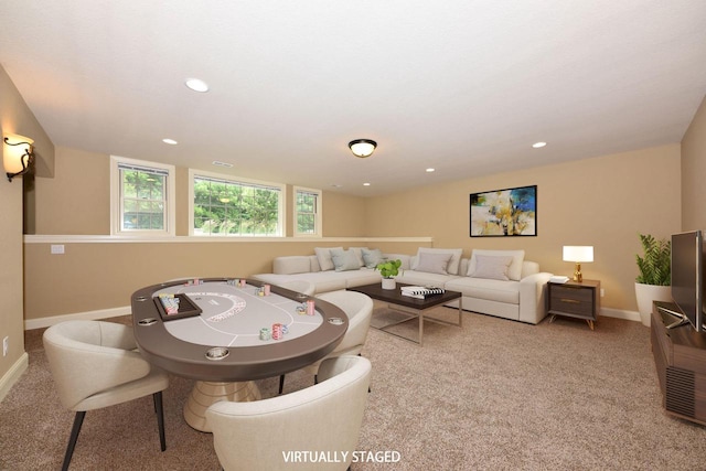 rec room with recessed lighting, baseboards, and light colored carpet