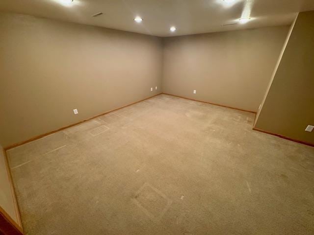 basement with light colored carpet