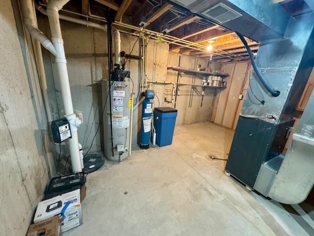 basement featuring water heater