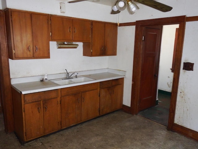 kitchen with ceiling fan and sink